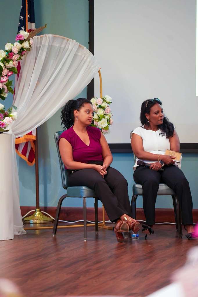Panelists listen during the community discussion.